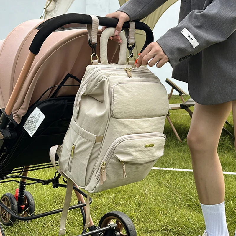 Bolsa de pañales informal de gran capacidad, bolso de maternidad multifunción para mamá con bolsillo separado en seco y húmedo, organizador de artículos esenciales para bebé de viaje - imagen 3