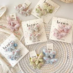 Gomas y pinzas para pelo de niña rosa con mariposa bordada primavera
