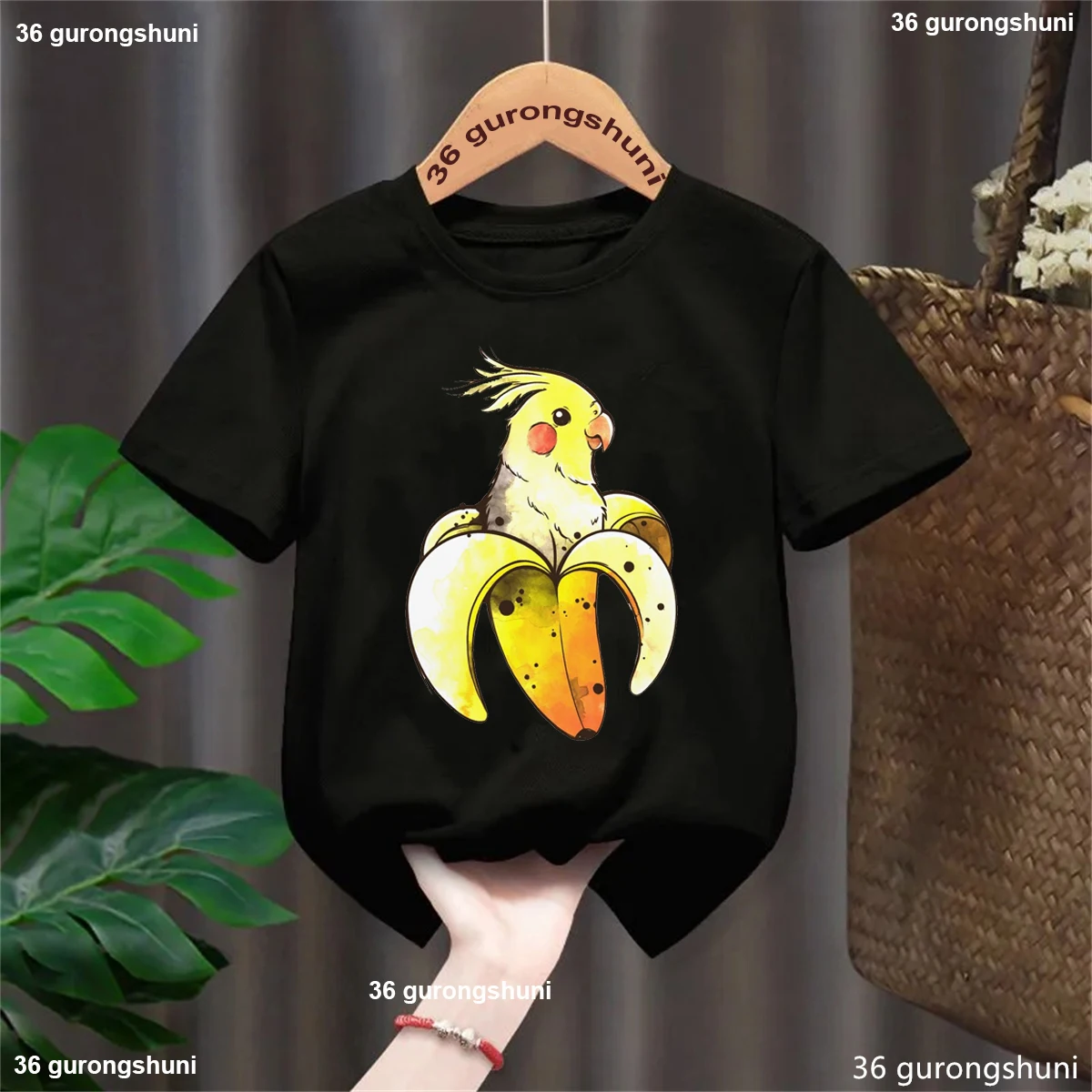 Camiseta con estampado de loro y plátano para niños y niñas, ropa divertida de pájaro, Harajuku, Kawaii, unicolor