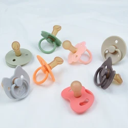 Babero de silicona floral con chupetero para bebé