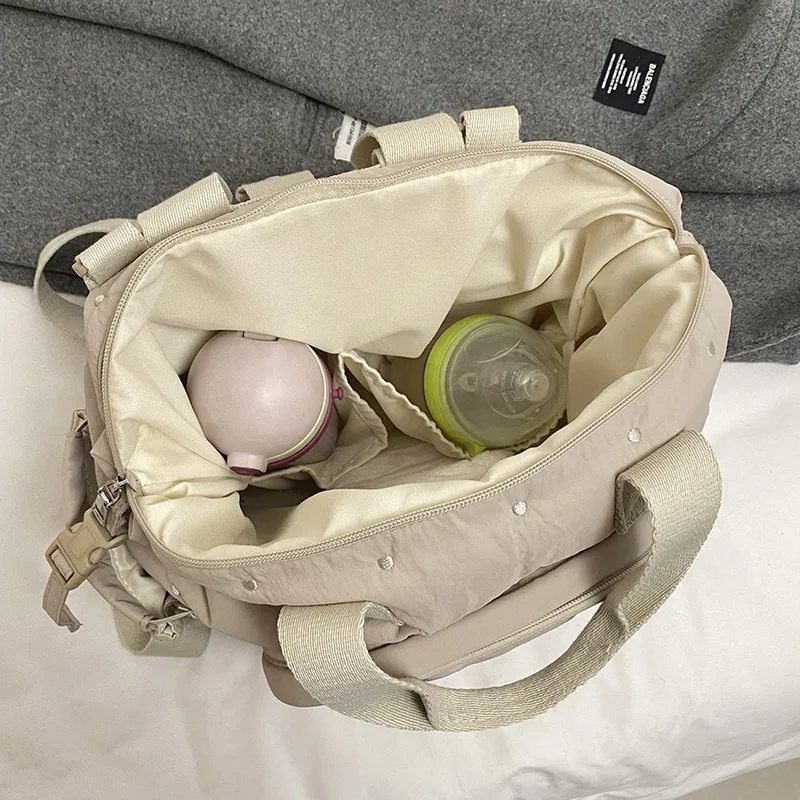 Bolsa de pañales multifuncional para recién nacidos, mochila sencilla de moda coreana, bolso para cochecito de Color sólido de gran capacidad - imagen 4