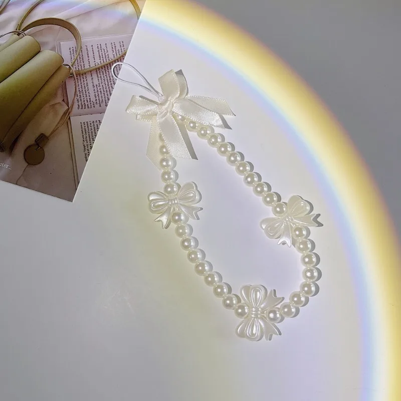 LLavero de cadena de perlas de imitación elegante, llaveros con cuentas de lazo de Camelia a la moda, correa para teléfono móvil antipérdida para niñas, cordón, regalos para amigos - imagen 3