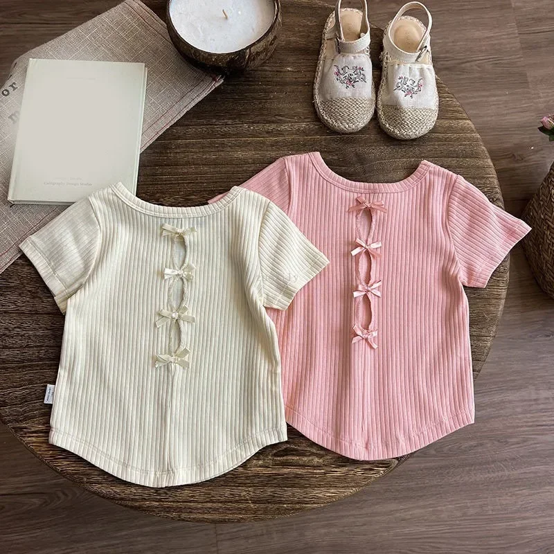 Camisetas de manga corta para niñas, novedad de verano 2021, camisetas de Edición coreana para niñas, pantalones cortos de princesa con lazo hueco en la espalda a la moda - imagen 3
