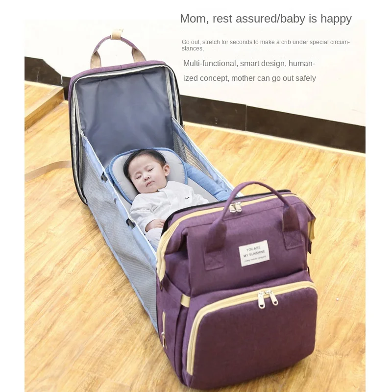 Mochila para pañales con cambiador de piel sintética para viaje - imagen 2