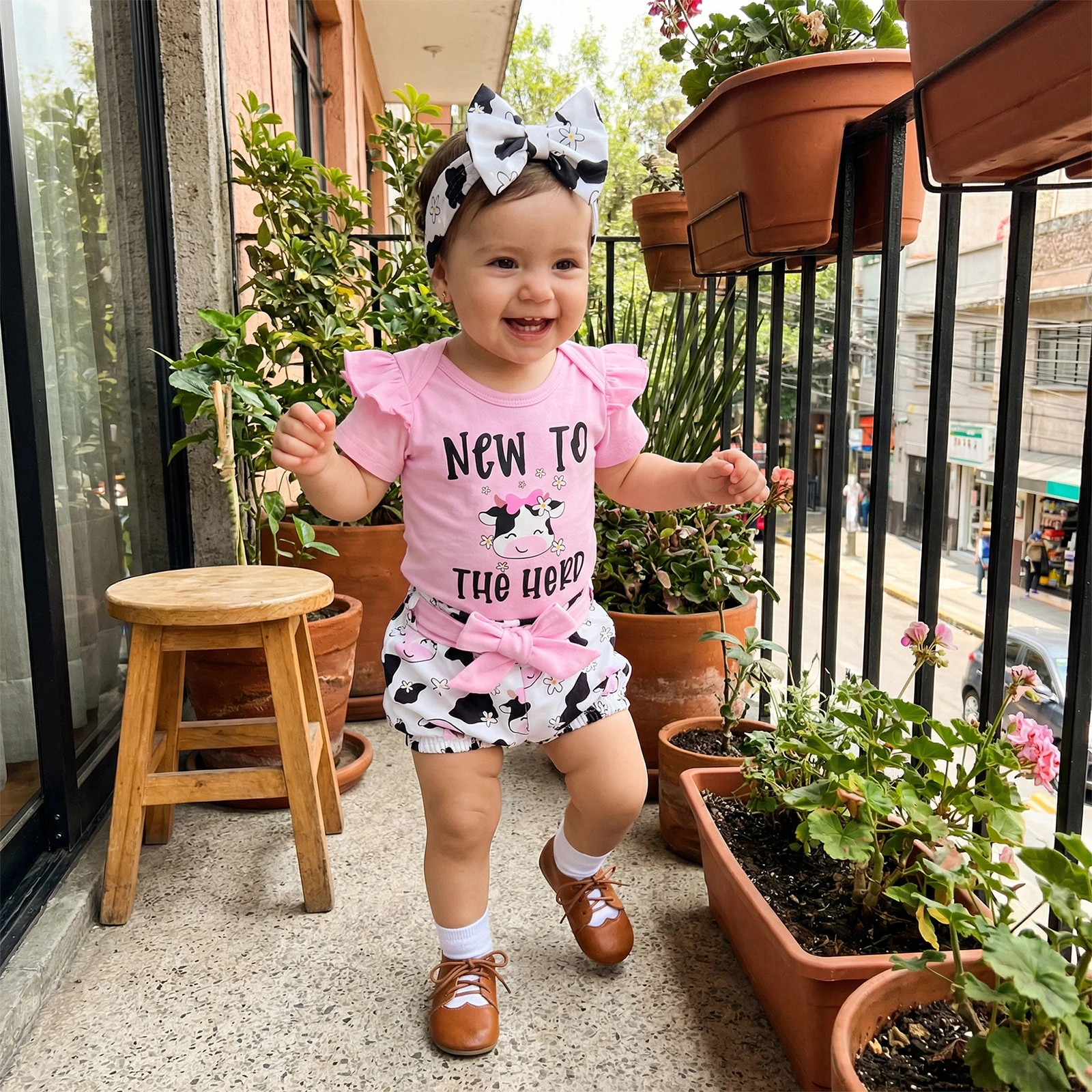 Conjunto verano bebé niña: mono vaca, botas letras y diadema lazo