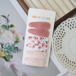 Horquillas de algodón para bebé con lazos y estampado floral