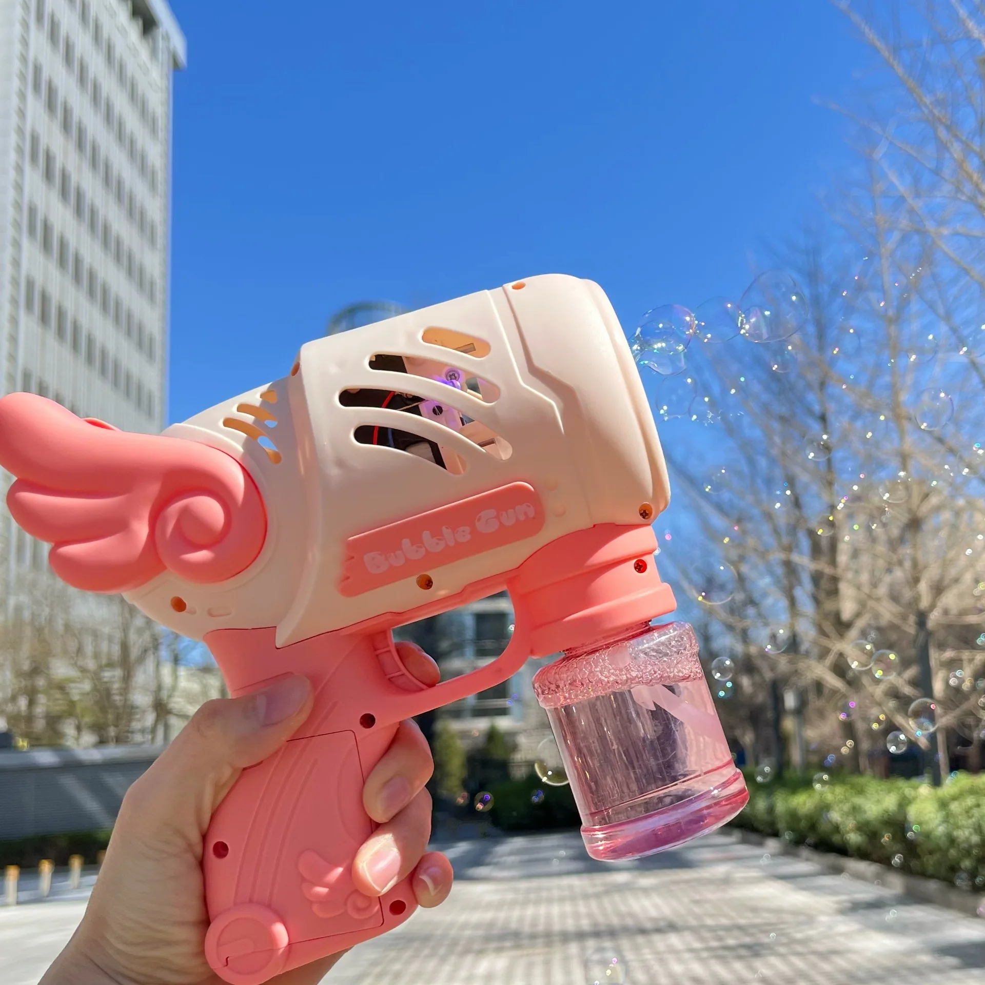 Máquina de burbujas de jabón para niños, juego al aire libre de 10 agujeros, pistola de burbujas automática con juguete ligero, regalos de cumpleaños para niños y niñas - imagen 4