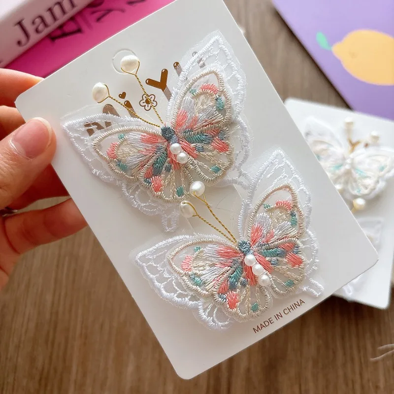 Pinza mariposa bordada con perla – Elegante accesorio pelo niña