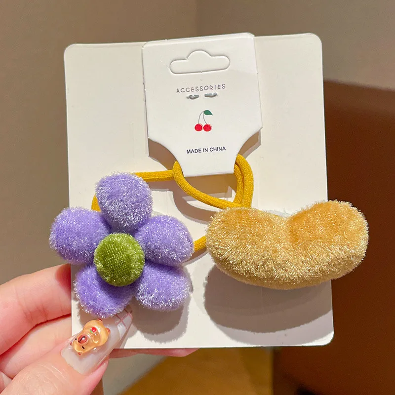 Lazos de tela con flores y corazones para el cabello de niña - imagen 2