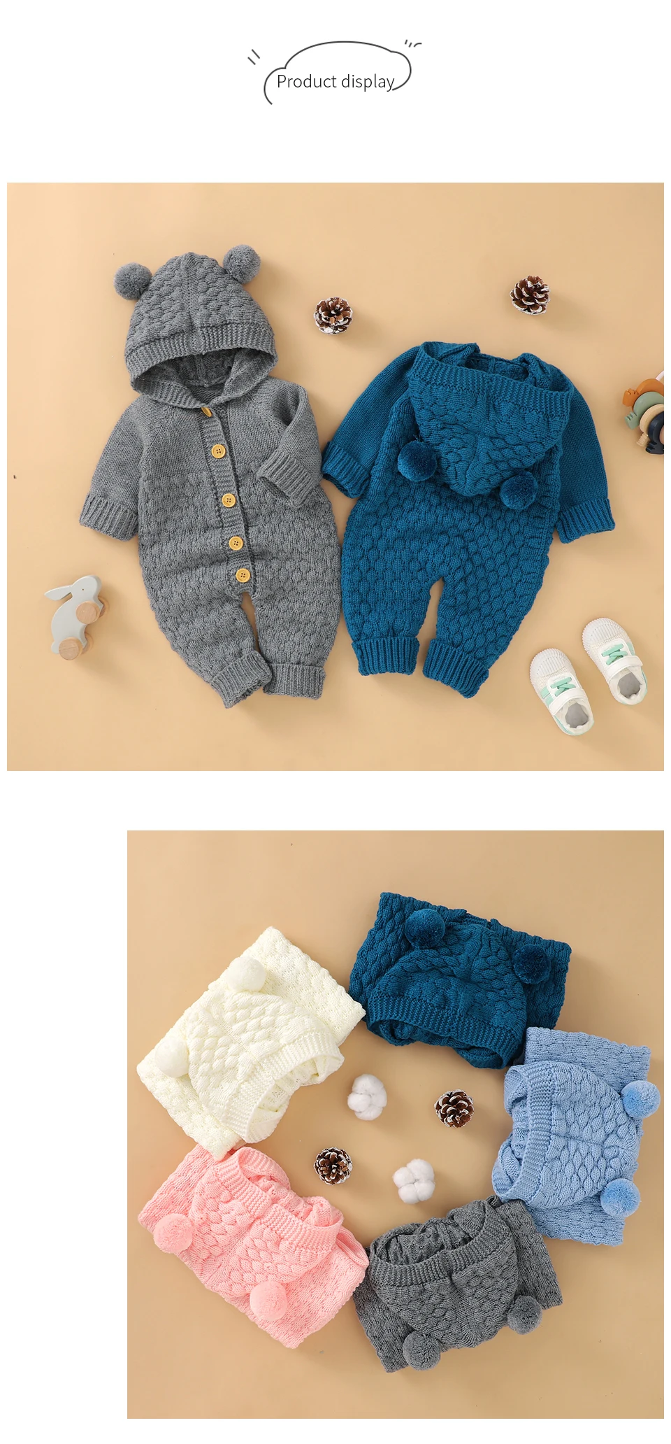 ropa de bebé que incluye un suéter azul y una sudadera gris