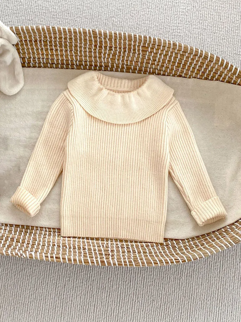 beige shirt