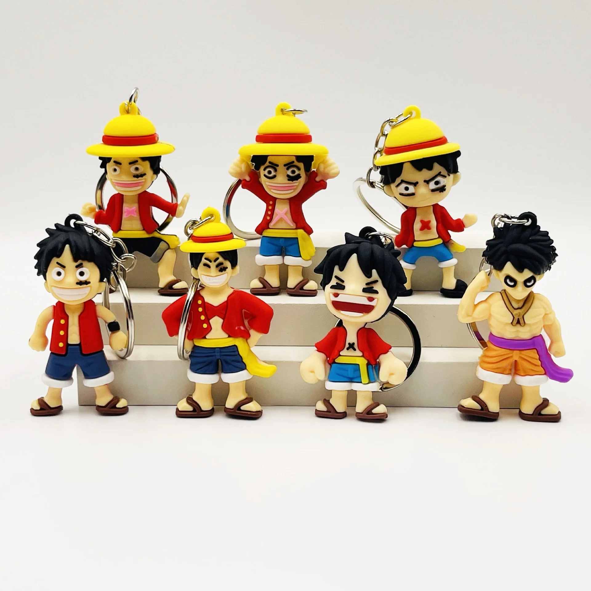 7 estilos Anime llavero de una pieza Luffy silicona lindo coche llavero colgante juguetes cumpleaños niños juguetes regalos