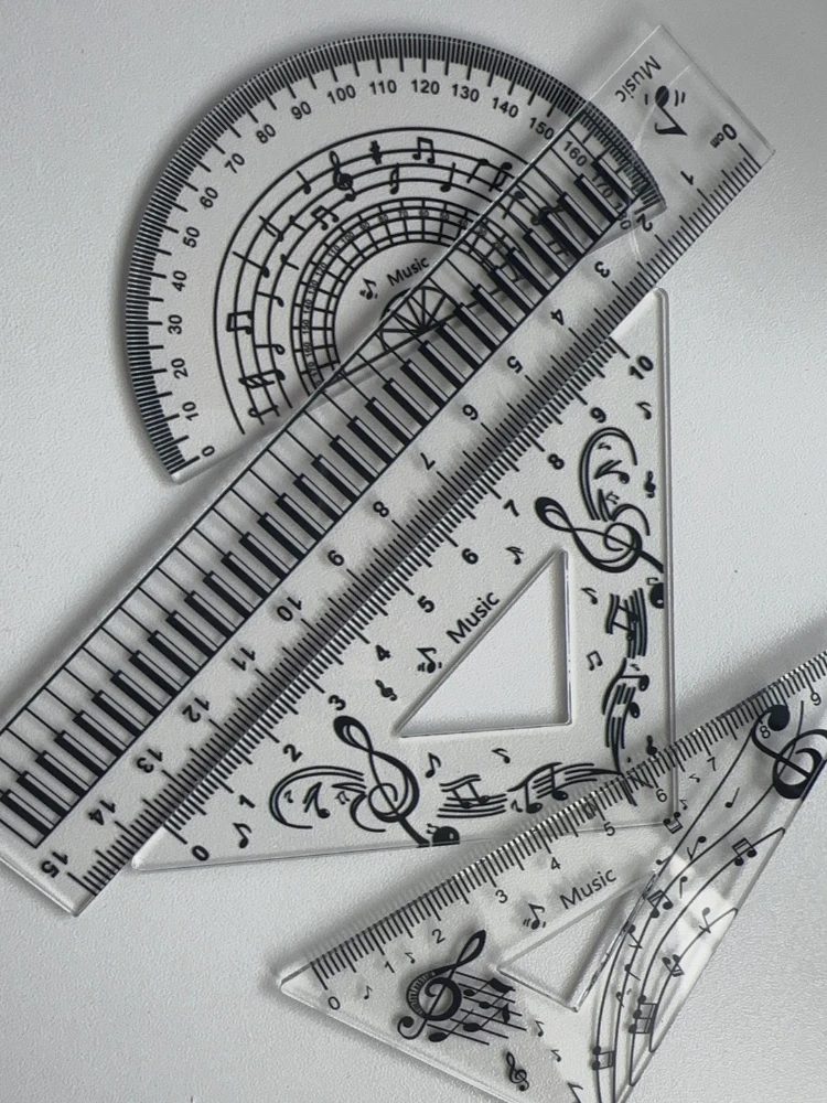 Juego de reglas transparentes escolares con diseño piano