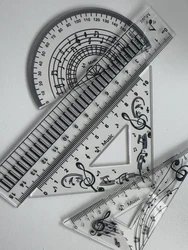 Juego de reglas transparentes escolares con diseño piano