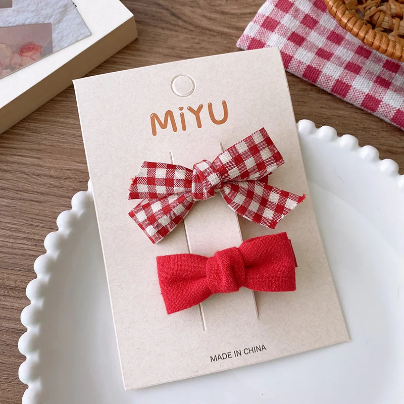 2 uds horquillas navideñas para el cabello para niñas Año Nuevo lazo rojo flequillo Clips accesorios para el cabello de bebé horquilla tejida dulce pinza para el cabello coreana para niños - imagen 5