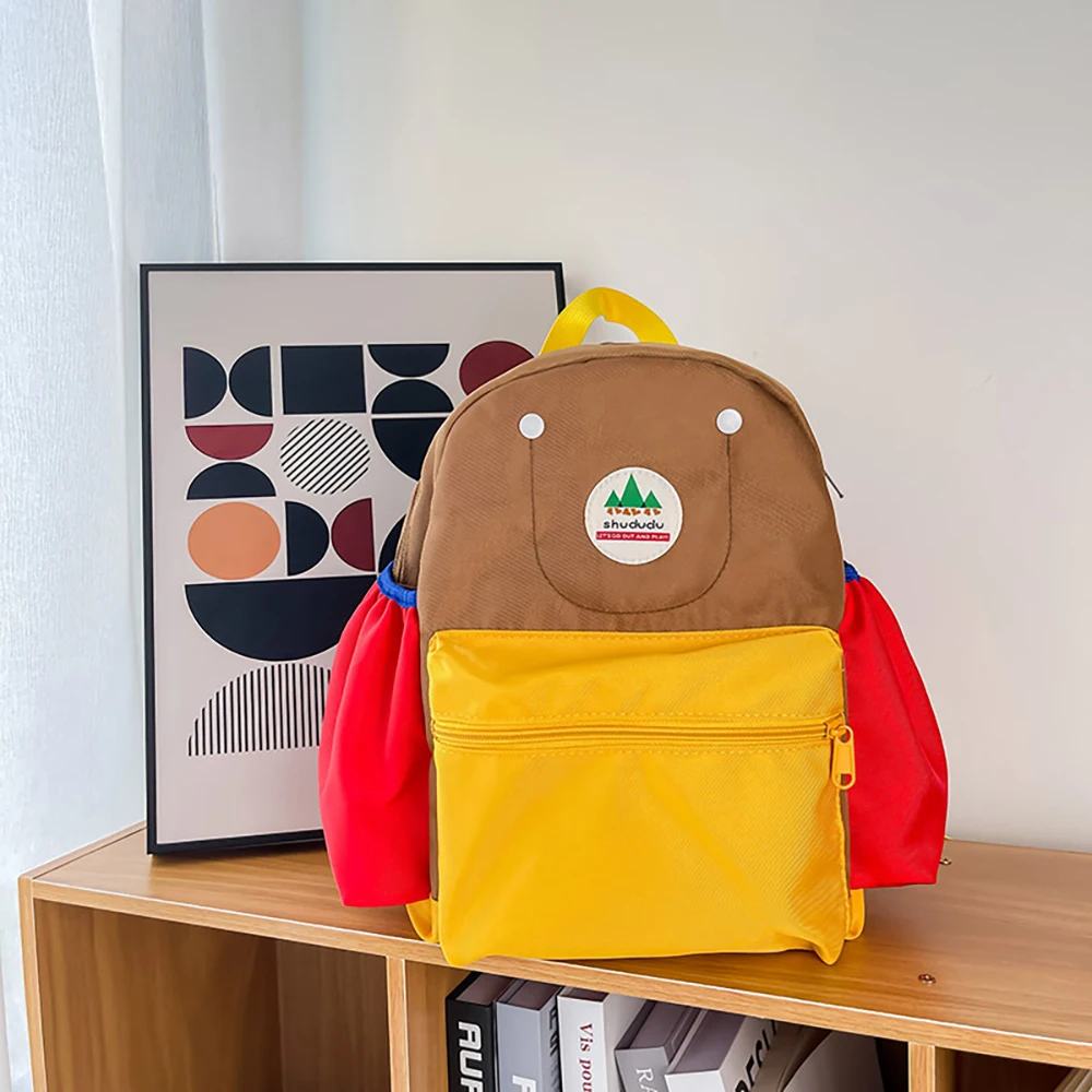 Mochila preescolar de lona contrastante con parche bordado