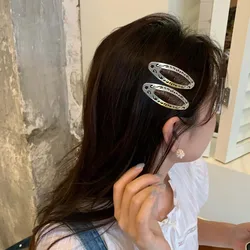 Clip de pelo ovalado plateado para niños modernos - estilo retro
