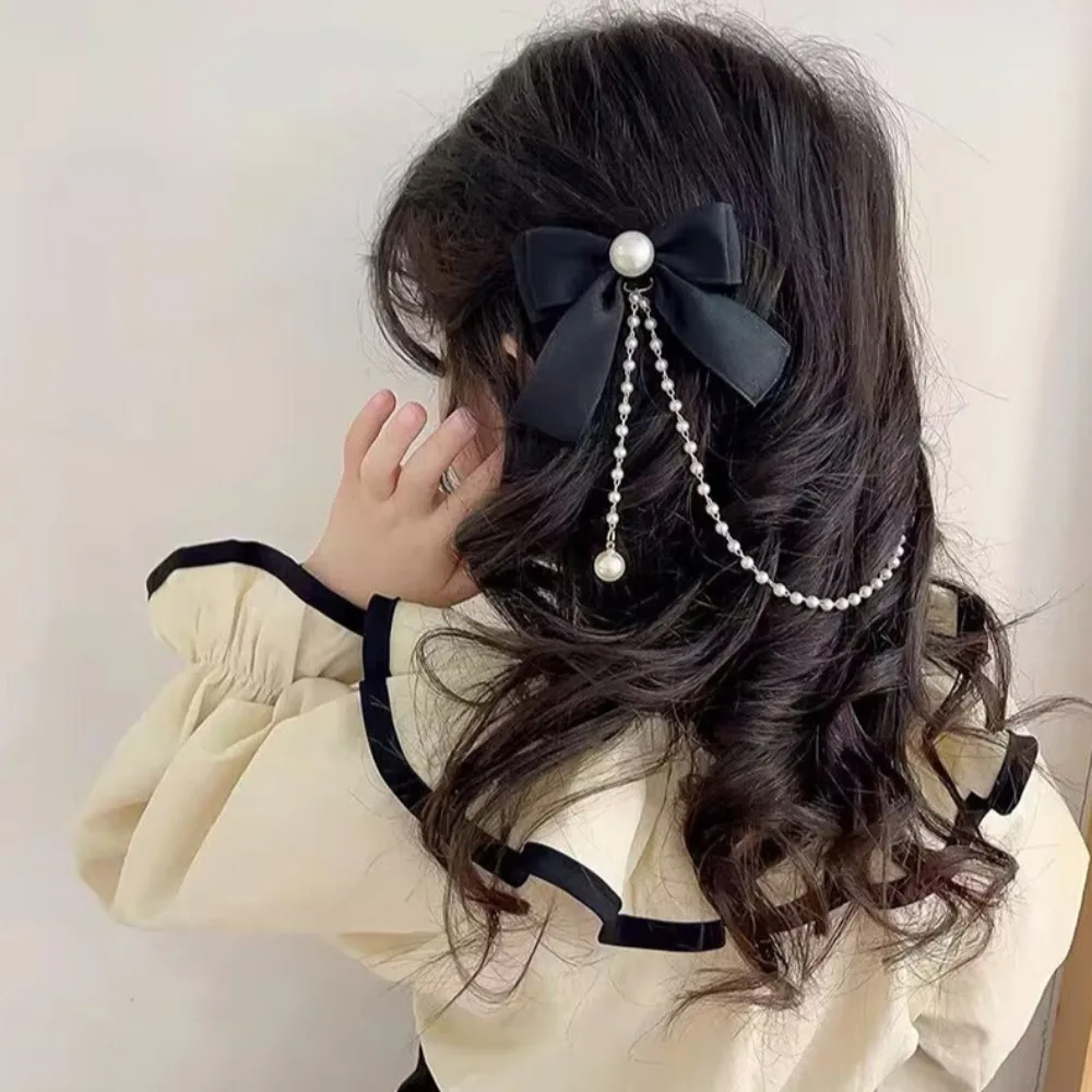 Horquillas lazo princesa con perlas rosas para niña - imagen 5