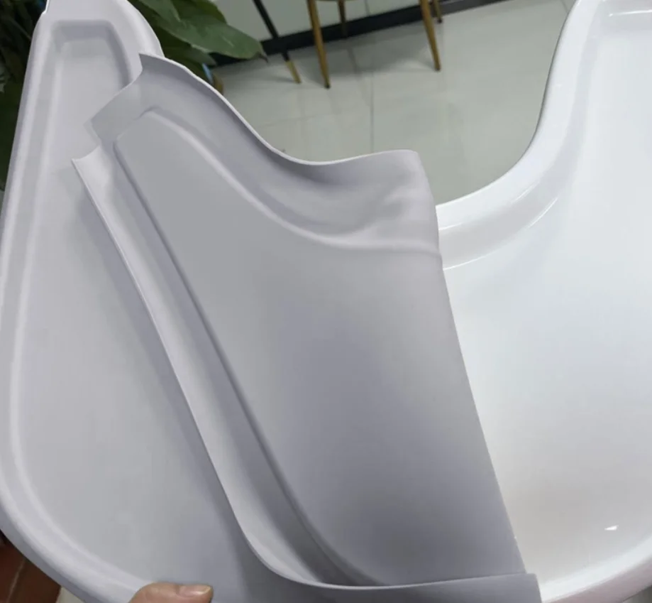 Tapete de silicona gris para silla de bebé Stokke