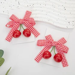 Pasadores arco cereza BB a cuadros rojos para el cabello bebe