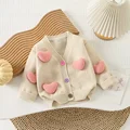 beige sweater