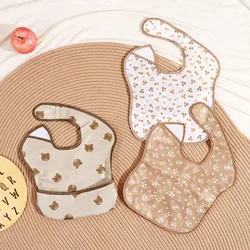 Baberos reversibles para bebé con bolsillo – Impermeables y lavables