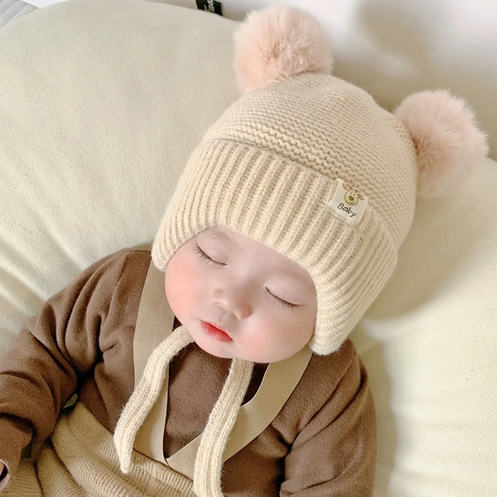 Gorro de invierno para bebé con orejeras y forro de algodón - imagen 2