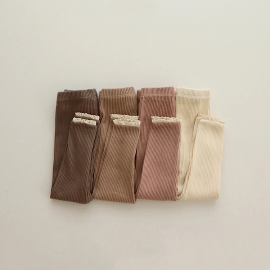 Leggings rosa con encaje detalle