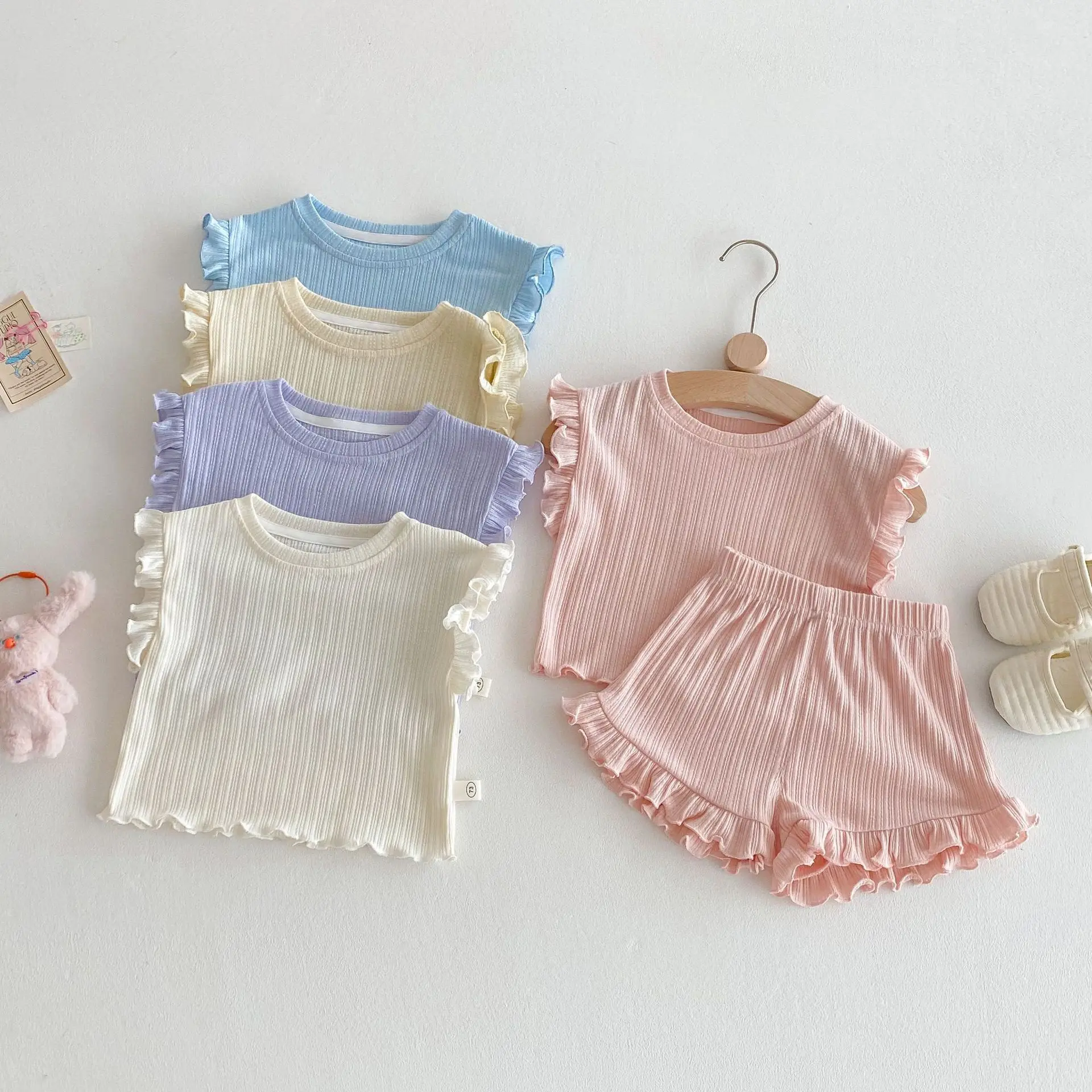 MILANCEL, conjuntos de camisetas sin mangas para niñas, chaleco con volantes de Color sólido para niños, pantalones cortos, traje de 2 uds, trajes de verano para bebés, ropa para niños - imagen 4