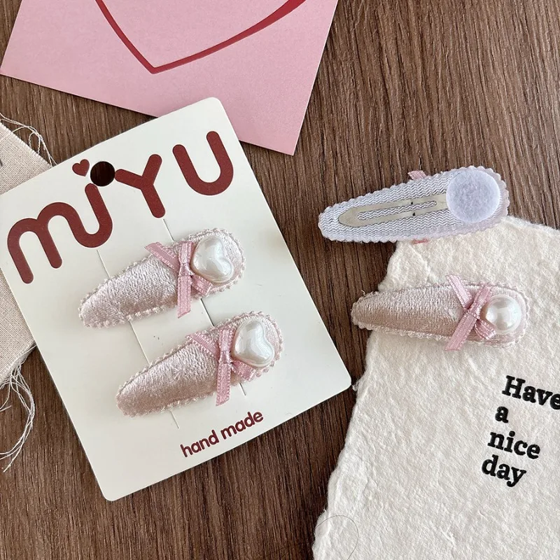 Versión coreana de terciopelo rosa, agradable arco de perlas, gota de agua para niños, Clip Bb, flequillo lateral, horquilla versátil para niñas - imagen 5