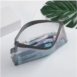 Estuche escolar de malla con cremallera – Transparente