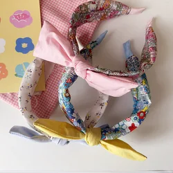 Diadema infantil con lazo floral - Accesorio para la cabeza pastel
