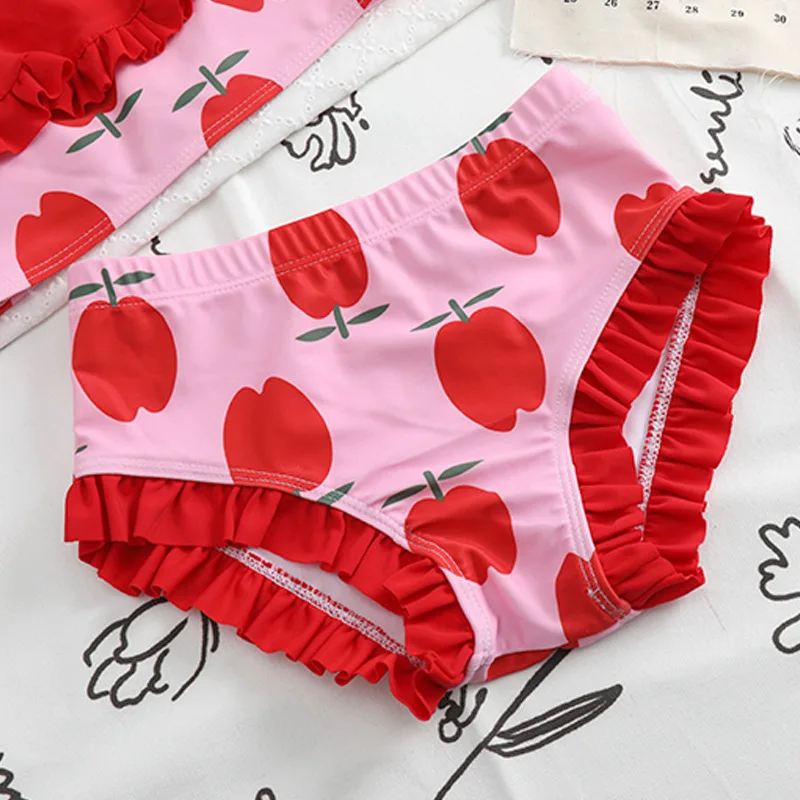 Bañador bebé niña con estampado de manzana y tutú - imagen 5