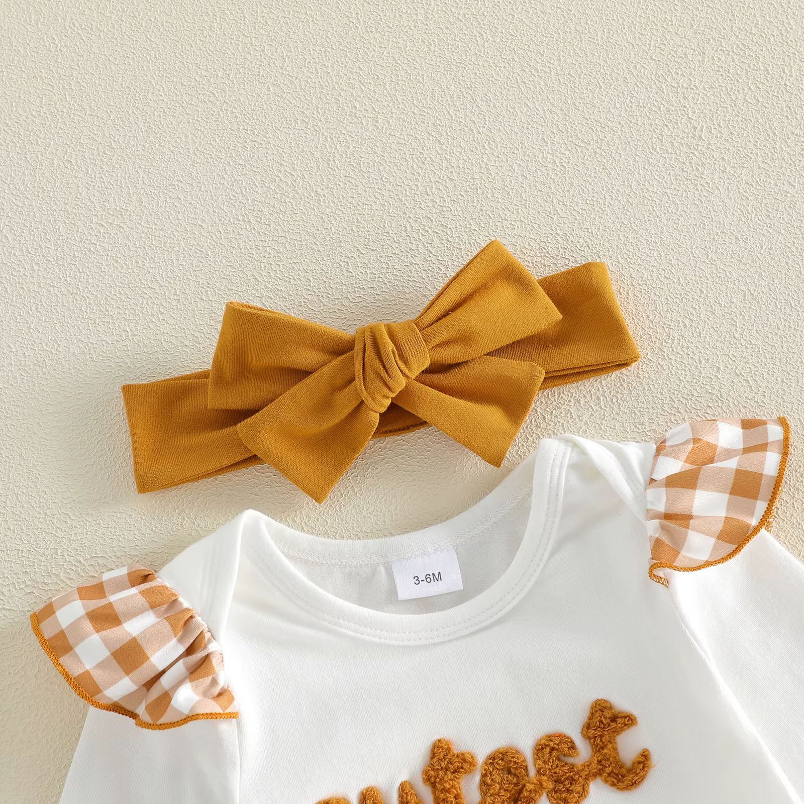 Conjunto de Pascua para niña: body con letras y shorts a cuadros