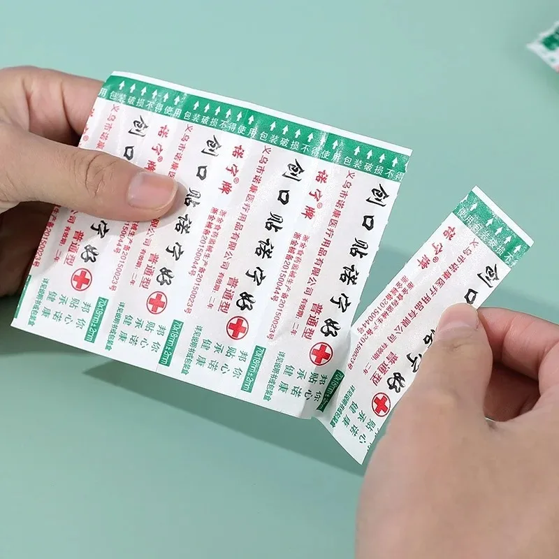 50 Uds tirita de yeso transpirable tiras de primeros auxilios parche de vendaje para heridas para el cuidado de la piel vendajes adhesivos Woundplast - imagen 3