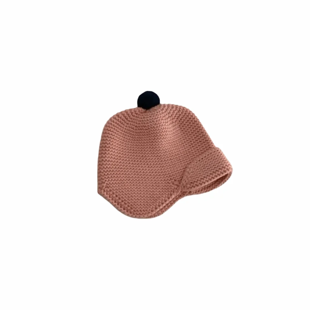 Nuevo Orejeras cálidas de invierno, gorro tejido de Color sólido a prueba de viento, gorro cálido de diseño bonito para niños y niñas