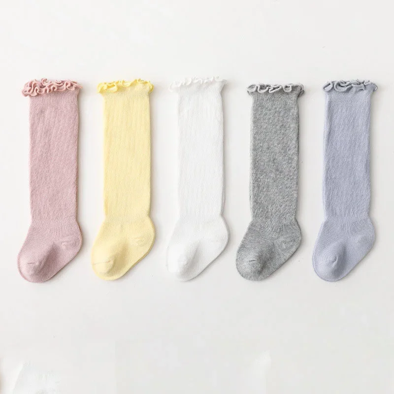Primavera novedad de verano volantes suelto Color sólido suave hasta la rodilla calcetines largos bebé algodón princesa ropa para recién nacidos medias