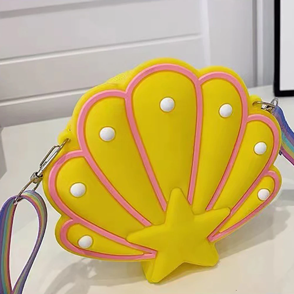 Bolso concha sensorial de silicona – Monedero reversible infantil