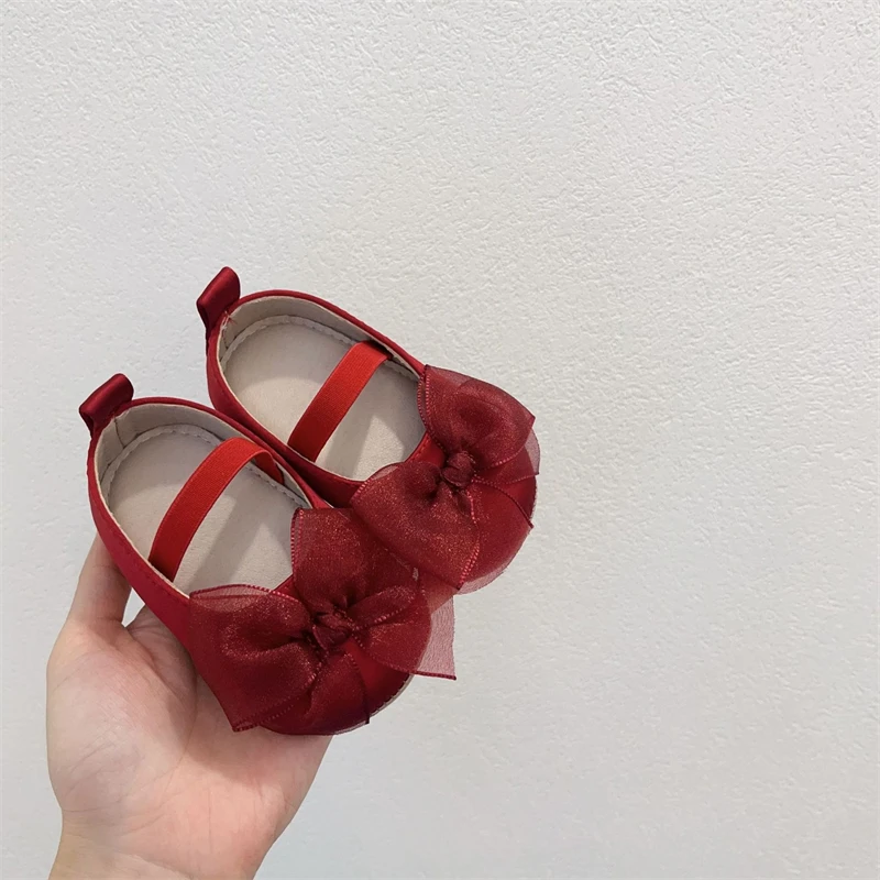 Zapatos para niñas, día de Navidad, zapatos rojos de princesa con lazo para niños, cómodos zapatos antideslizantes de suela blanda para niños pequeños, primeros zapatos para caminar - imagen 2