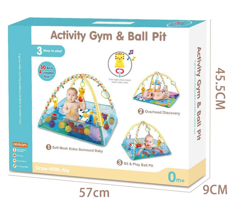 Una caja de un gimnasio de juego y un pozo de pelota para un bebé