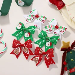 Pinzas pelo navideñas niña con lazo Papá Noel y alce
