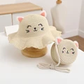 beige hat bag