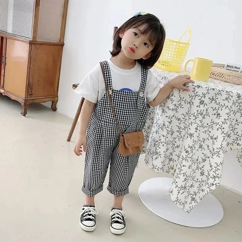 Pantalones a cuadros blancos y negros para niñas, monos para niños, novedad de verano, ropa para niños, peleles informales coreanos para niñas, pantalones finos para bebés