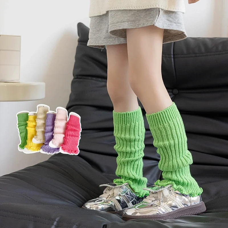 Primavera nuevo Color caramelo niñas calentadores de piernas de punto calcetines con volantes puños calcetines de pierna de moda antideslizantes calcetines lindos juguetones para niñas
