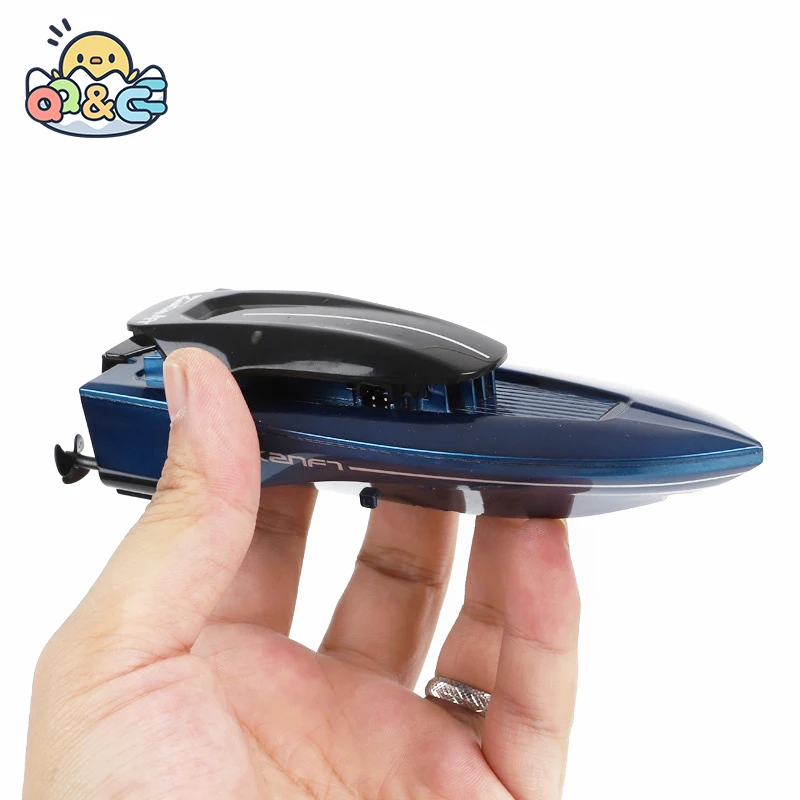 Barco teledirigido de carreras con luces LED para niños
