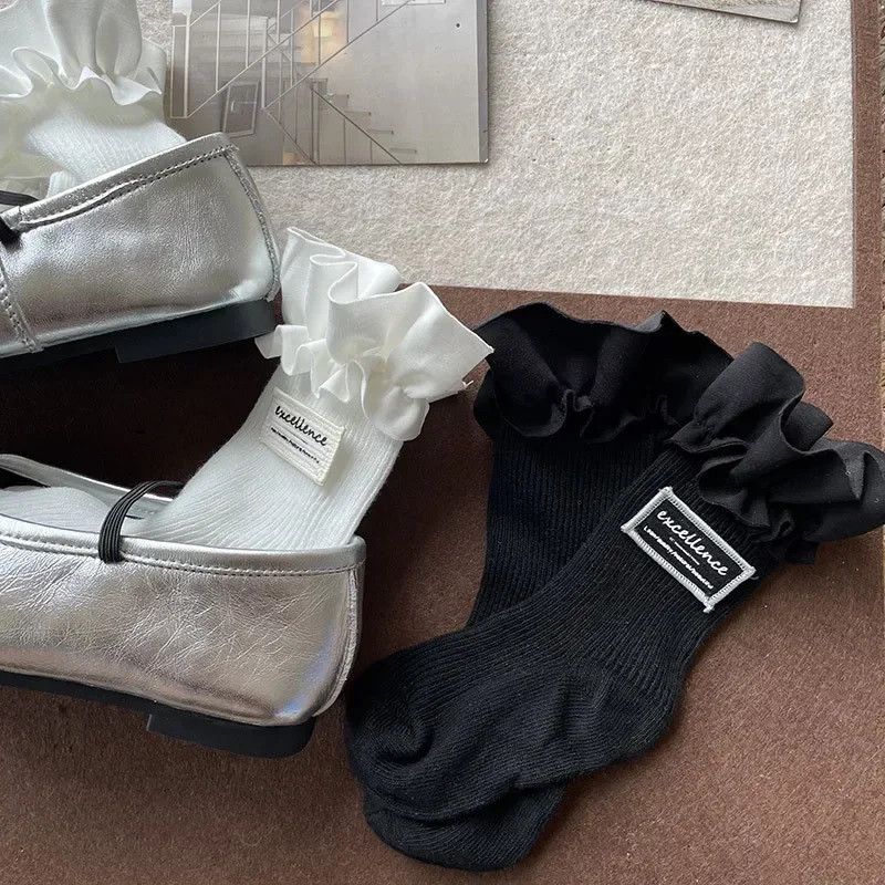 1 par de calcetines sencillos a la moda Ins para niños, calcetines hasta la pantorrilla para niña, calcetines con volantes de Color blanco y negro para niños, calcetines escolares de primavera de algodón suave - imagen 5