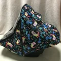 Dinosaur rain cover