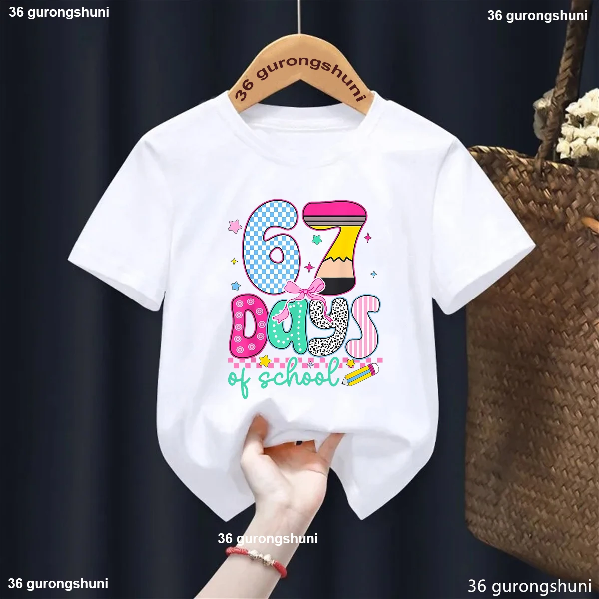 Camiseta con estampado de lazo de estrellas de 67 días de escuela, ropa Kawaii para niños y niñas, Tops de verano, camisa de manga corta, camiseta informal sólida - imagen 3