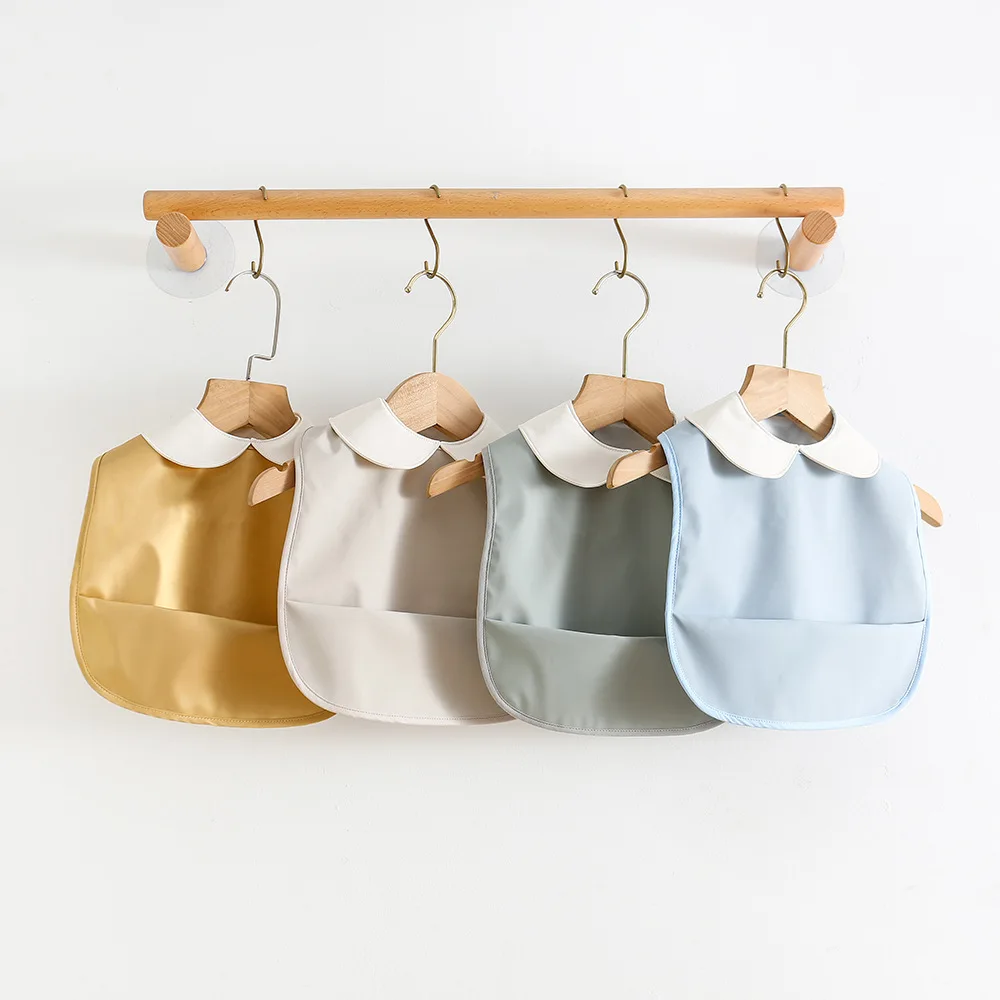 Nuevos Baberos impermeables para bebé, bonito paño sólido sin mangas, delantal de alimentación, babero, paño suave para eructar para niños pequeños, Baberos Bandana para niñas - imagen 4