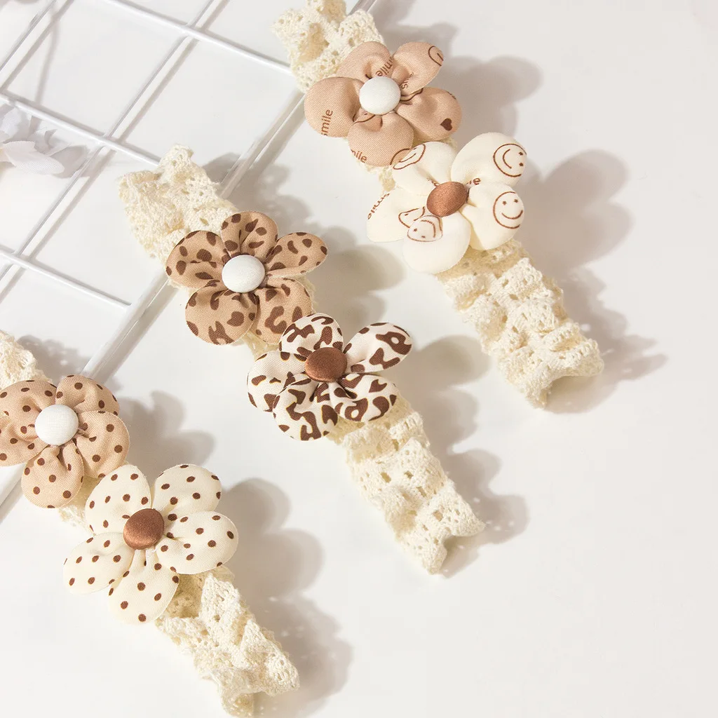 Diadema bebé con flores 3D y estampado leopardo suave - imagen 2